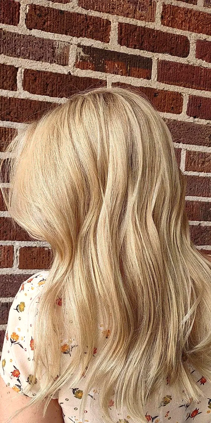 Soft golden blonde long layered hair